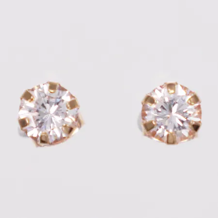 Ett par örhängen vita stenar, 4mm, 18K  Vikt: 0,9 g