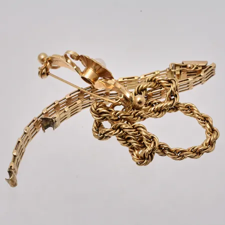 Diverse defekt guld, 18K, vikt 16,38g.