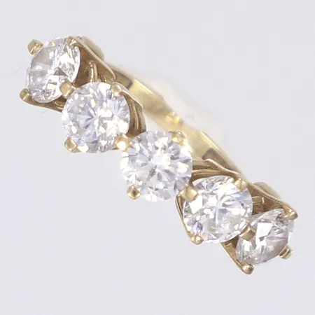 Ring med vita slipade stenar stl 16½ bredd 2-5mm 10K Vikt: 3,3 g