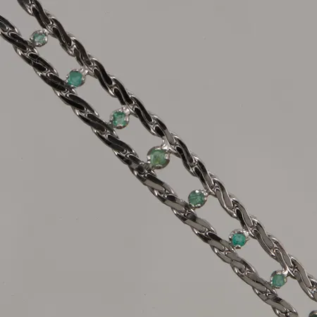 Armband med smaragder, 17cm, bredd:5-8mm, vitguld, 18K 12,9g.