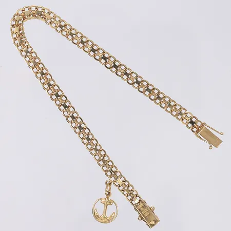 Armband X-länk med en berlock, längd 19,5 bredd 5mm svenska stämplar Stockholm 1962 18K Vikt: 9,6 g