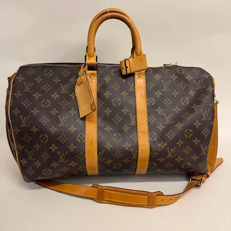 Väska Louis Vuitton, Keepall 45, höjd 27cm, bredd 20cm, monogramcanvas, datumkod V.I 8912, hänglås med nyckel, axelrem, adresstag, kvitto från The Vintage Boutique år 2016, fläckar på läder, missfärgningar på beslag, dustbag