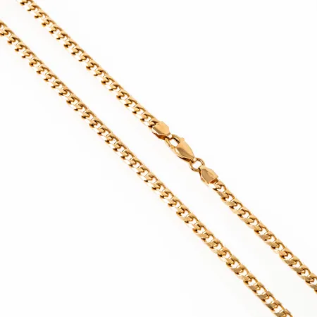 Kedja Pansar i 18K guld. Den är 46 cm lång, 4 mm bred och väger 25,8g. Karbinhake.