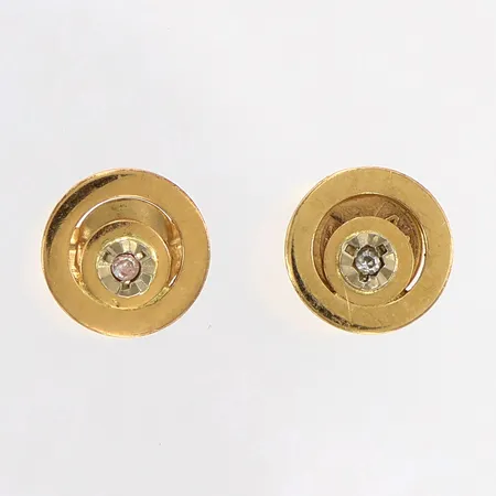 Ett par örhängen diamanter 2 x ca 0,01ct, Ø7mm, 18K.  Vikt: 1,1 g