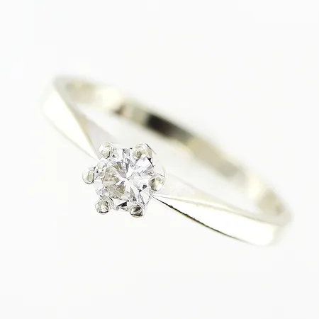 Ring diamant ca 0,17ct, stl 14¾, vitguld, 18K Vikt: 1,7 g