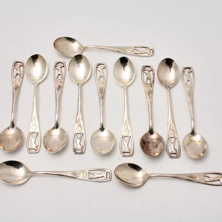 12st skedar i silver, 10,5cm, modell Jämtskogen, 830/1000, tillverkad av Schalin Bror Guld Ab, vikt 153,53g.