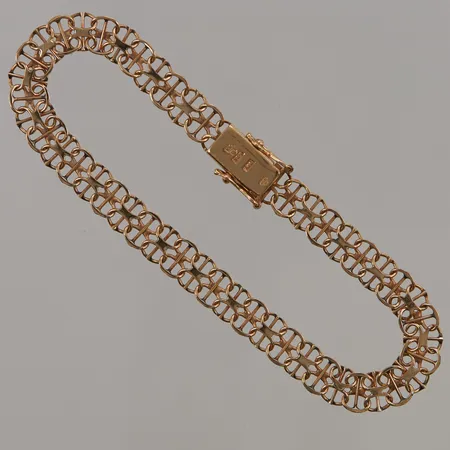 Armband x-länk med stav 18,5cm, bredd:6mm, 18K 7,3g.