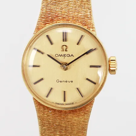 Armbandsur Omega Geneve Ø19mm, manuell, integrerad guldlänk med viklås, kaliber:620, referensnr:511297, serienr:30641918, stavindex, glas med Omega logga, bruttovikt 40,60 gram, originaletui, 18K