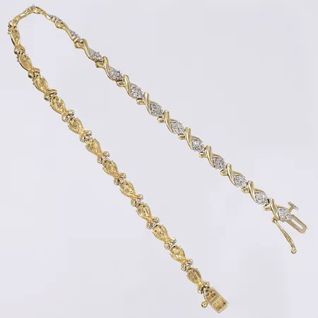 Armband med diamanter totalt 104xca 0,005ct 19,5cm bredd 4mm 18K Vikt: 9,4 g