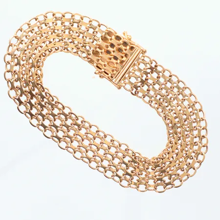 Armband X-länk längd 18,5cm, bredd 13mm,  Ädelsmycken Aktiebolag Stockholm år 1968, 18k    Vikt: 16,5 g