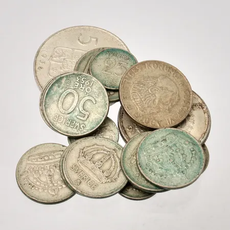 Diverse mynt i silver, 400/1000, vikt 98,65g.