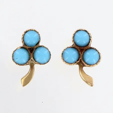 Ett par örhängen blå stenar 6x9mm, skruvfästen, missfärgning, 18K.  Vikt: 0,8 g