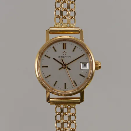 Damur Eterna 18K, 22mm, quartz, armband x-länk i 18K, totallängd ca 17cm, bredd:8mm, går ej, batteribyte krävs, gravyr, 18K bruttovikt 18,7g.