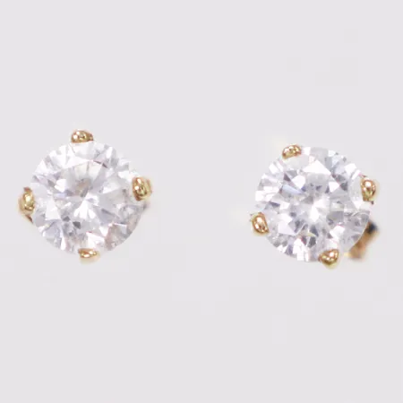 Ett par örhängen vita stenar, 4mm, 18K  Vikt: 1 g