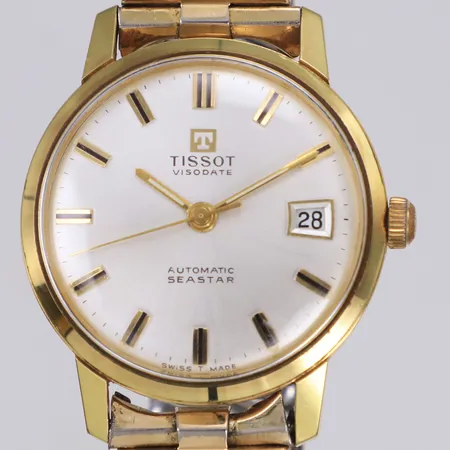 Herrur, Tissot Seastar, Visodate automatic, Ø33,8mm, 1970-tal, guldpläterad, lätta bruksspår, putsat plastglas, flexband