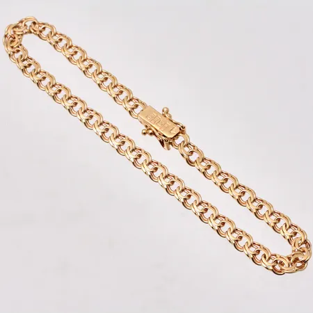 Armband i 18K guld, 18,5cm, Bismarck, bredd 4,5mm, tillverkad av Jo-Ans Guld AB, år 1961, vikt 7,45g.