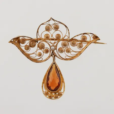 Brosch med röt sten 36x42mm, 18K, 4,2g.