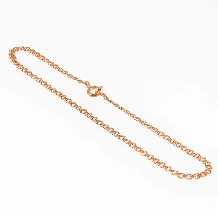 Vristlänk Bismarck i 18K guld. Det är 23 cm långt, 2,5 mm brett och väger 1,9g. Springring. 