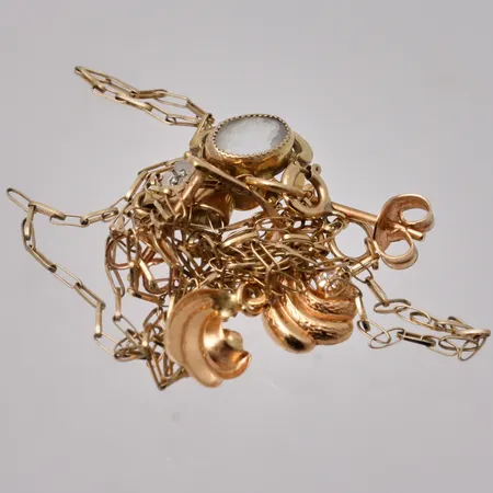 Diverse defekt guld, 18K, vikt 2,13g.