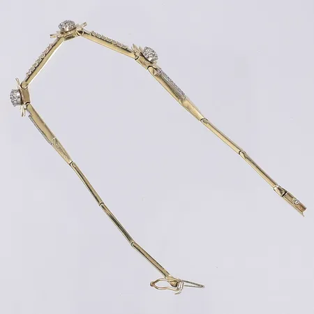 Armband med vita stenar längd 17,5cm bredd 2-10mm 14K Vikt: 8,4 g