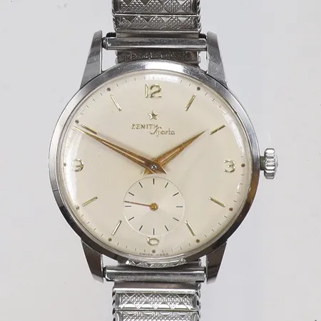 Herrur Zenith Sporto Ø37mm "s.k. Jumbo Dial" boett nr. 9465457, manuell uppvridning, glas med ytliga repor, originalkrona, gravyr, 1950-tal, flexlänk 