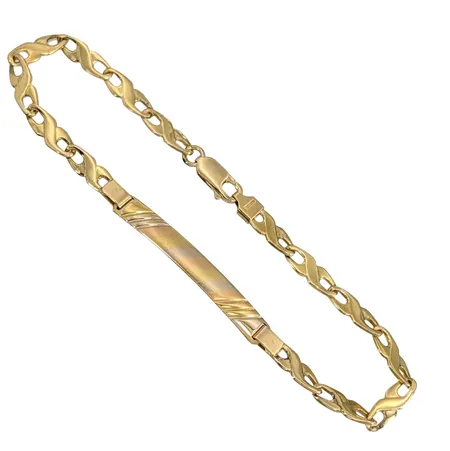 Armband med Bricka, 18K guld, ograverad, längd 21,5 cm, bredd 4,3 - 5 mm, fint skick Vikt: 11,5 g
