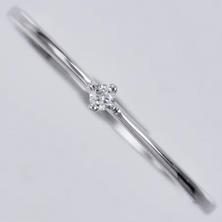Ring med diamant ca 1x0,02ct, GHA , stl: 19, bredd ca 1mm, 18K Vikt: 1,3 g