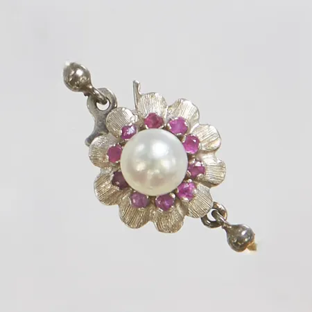Lås med odlad saltvattenpärla samt rosa safirer, ca 23x11mm, vitguld, 18K, bruttovikt: 3,1g.