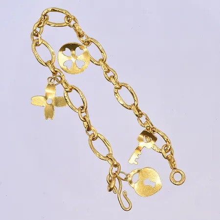 Armband med berlocker, längd 16,5 cm, bredd länk 7 mm, 23K. Vikt: 7,5 g