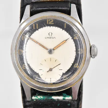 Herrur Omega stål  Ø 35 mm, manuell, repigt plexiglas,troligen 1950-tal, läderband ej original 