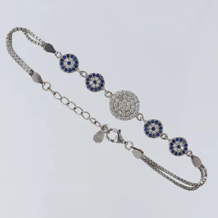 Armband med vita stenar samt blå stenar, längd 16-19cm, bredd ca 2-11mm, 925/1000 silver  Vikt: 6,5 g