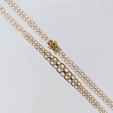 Kedja doserad X-länk, 43,5cm, bredd 4,8-8,4mm, något ojämna länkdelar, 18K  Vikt: 10,5 g