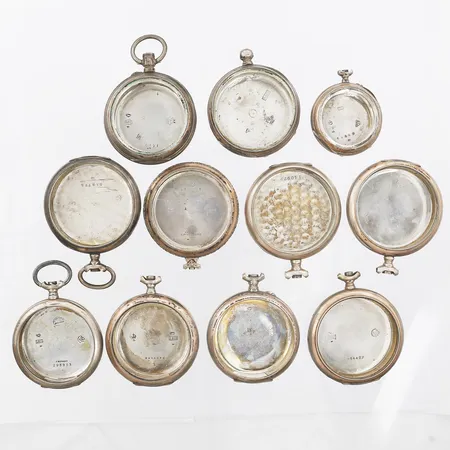 11 Fickursboetter, olika diametrar, gravyr, defekta, 800/1000 silver Vikt: 236,7 g