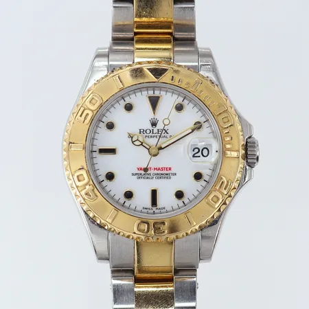 Rolex Oyster Perpetual Date, Yatch-Master, stål/guld, automatisk, Ø35mm, datum, ref-nr:168623, serie-nr: G159859, Kaliber: 2235, verk-nr:A3068022, boett-nr:2260, länk- nr: 78743, Oysterlänk stål/guld, 7 st monterade länkar, två extra länkbitar, box, år ca 2010,  buckla på boett, repor, rotor troligen lös, Inga övriga tillbehör. 