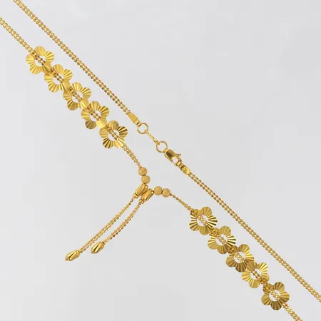 Collier 42,5cm, bredd 9x35mm, ena hänget delvis lös, 21K Vikt: 8,9 g