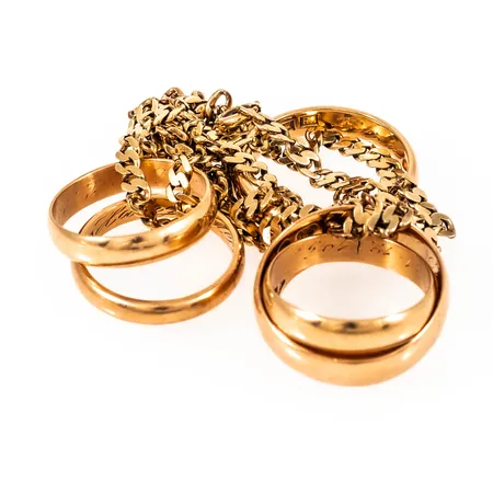 Diverse defekt/graverat guld i 18K. Vikt: 32,9g. 