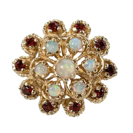 Ring, 14K guld, naturliga Opaler, Granater, enligt uppgift inköpt i USA, Ø17¾ mm, bredd 2-18 mm, fint skick, stenar utan anmärkning Vikt: 6,9 g