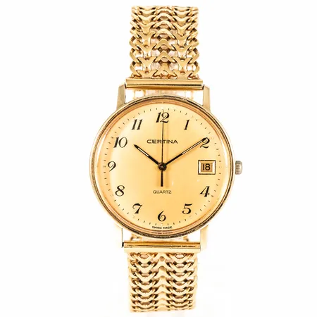 Herrur Certina i 14K guld med band (fiskbenslänk) i 18K. Boett 33,5 mm, datum, quartz, repigt glas. Total längd 20,5 cm. Bruttovikt: 53,2g. 