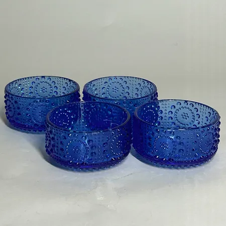 4 Skålar från Riihimäen Lasi design av Nanny Still från serien Grapponia tillverkad mellan 1968-75, ca 5cm höga Ø9,5cm, blå