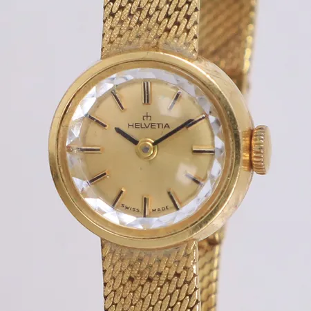 Damur Helvetia 18K, manuell, 17mm, boettnr 13321, integrerat guldarmband 18K, ca 18cm, defekt, går ej, skadat armband, bruttovikt 24,9g.