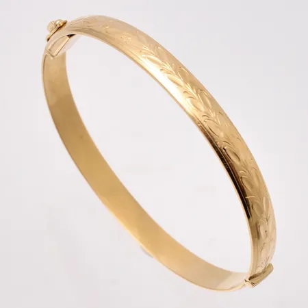 Armring i 18K guld, 18cm, bredd 6,4mm, tillverkad av Bg:S Guld Bernt Gottschalk, år 1967, vikt 25,6g.