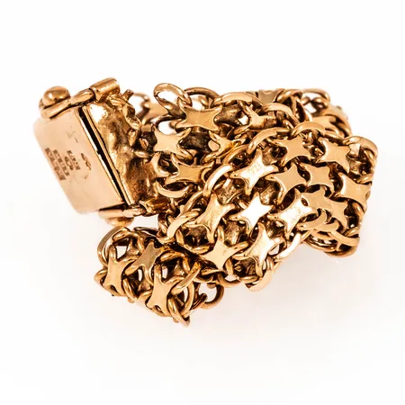 Defekt armband i 18K guld. Vikt: 14,6g.