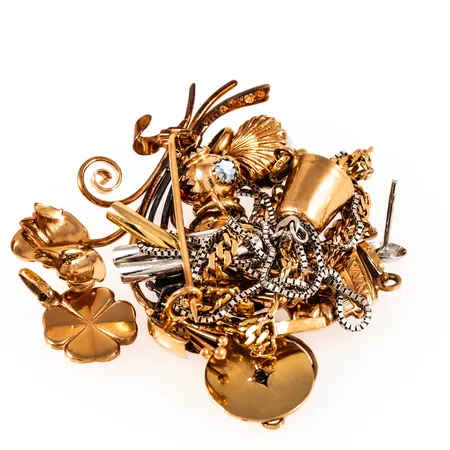 Diverse defekta smycken 18K 22,5g bto. 