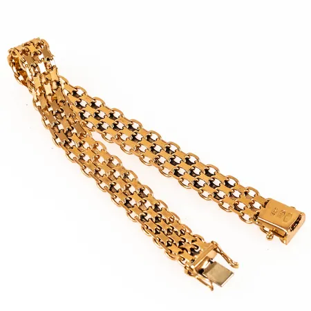 Armband x-länk i 18K guld. Det är 19 cm långt, 9,5 mm brett och väger 20,7g. Kistlås med låsbleck i vitt guld. Italienska tillverkarstämplar 750.