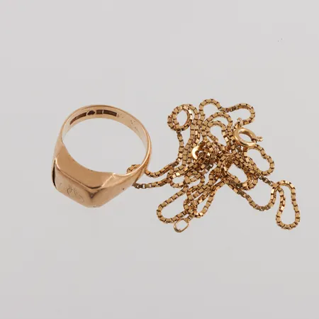 Trasigt guld 18k. Vikt: 12,1 g