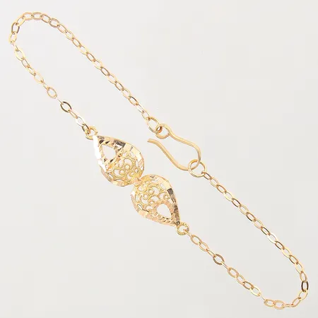 Armband Ankar med genombruten dekor, längd 19cm, bredd 2-10mm, 18K Vikt: 3,3 g