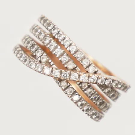 Ring med diamanter ca 73xca0,01ct, stl 17¼, bredd 6,5-8,8mm, repig, 18K Vikt: 6,4 g