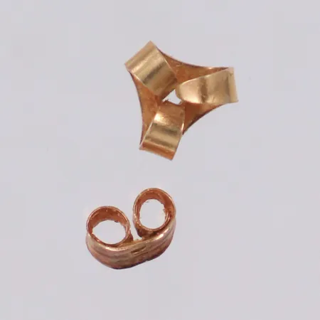 Två snurrebussar, omaka, 18K Vikt: 0,3 g