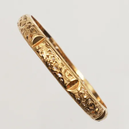 Armring Ø48mm, bredd ca 6,5mm, innermått ca 13cm, 18K  Vikt: 4,2 g