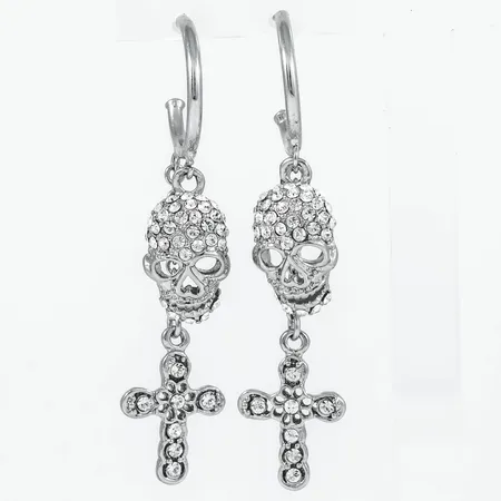 Hängande örhängen Rock by Sweden av Laila Bagge: Creoler Ø 20 mm, döskalle och kors i metall med strasstenar. De är 2 - 15 mm breda, 66,5 mm långa. 